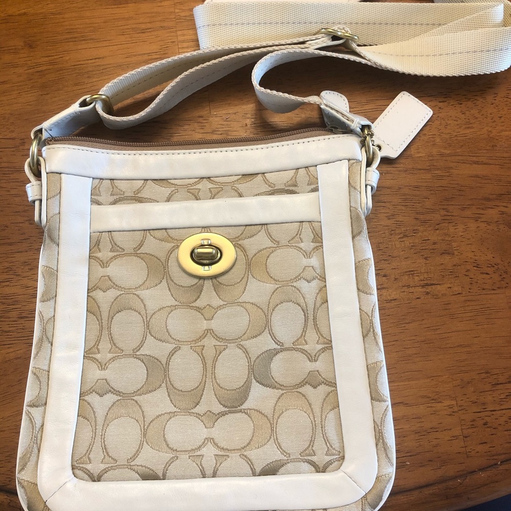 Coach cross body bag. Tan and gold. 8.5x7.5 inches